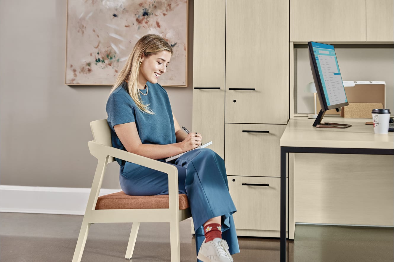 Confer chair with Concinnity desk