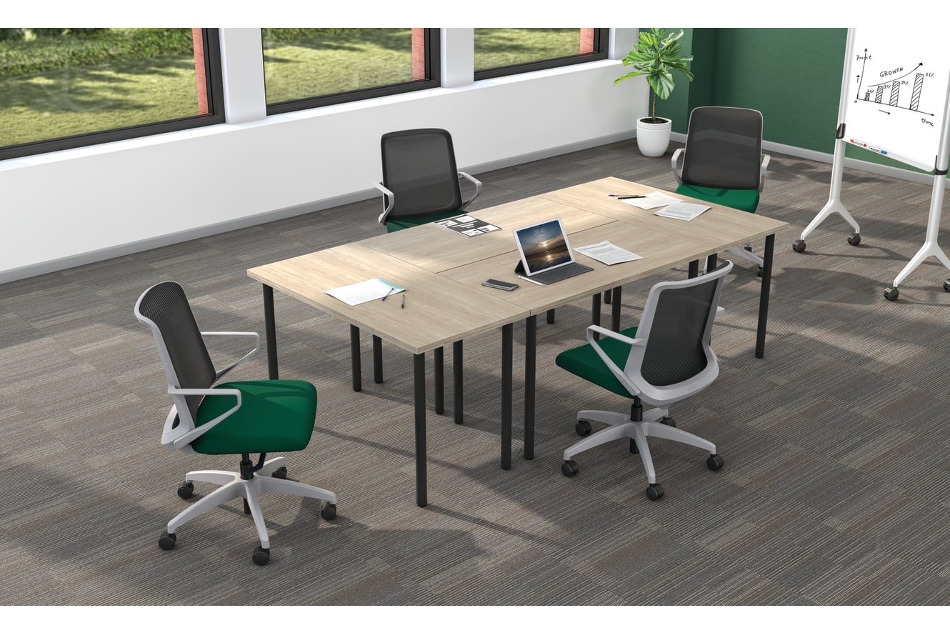 Huddle rectangle tables shown in Kingswood Walnut tops and Black legs with Cliq task seating.