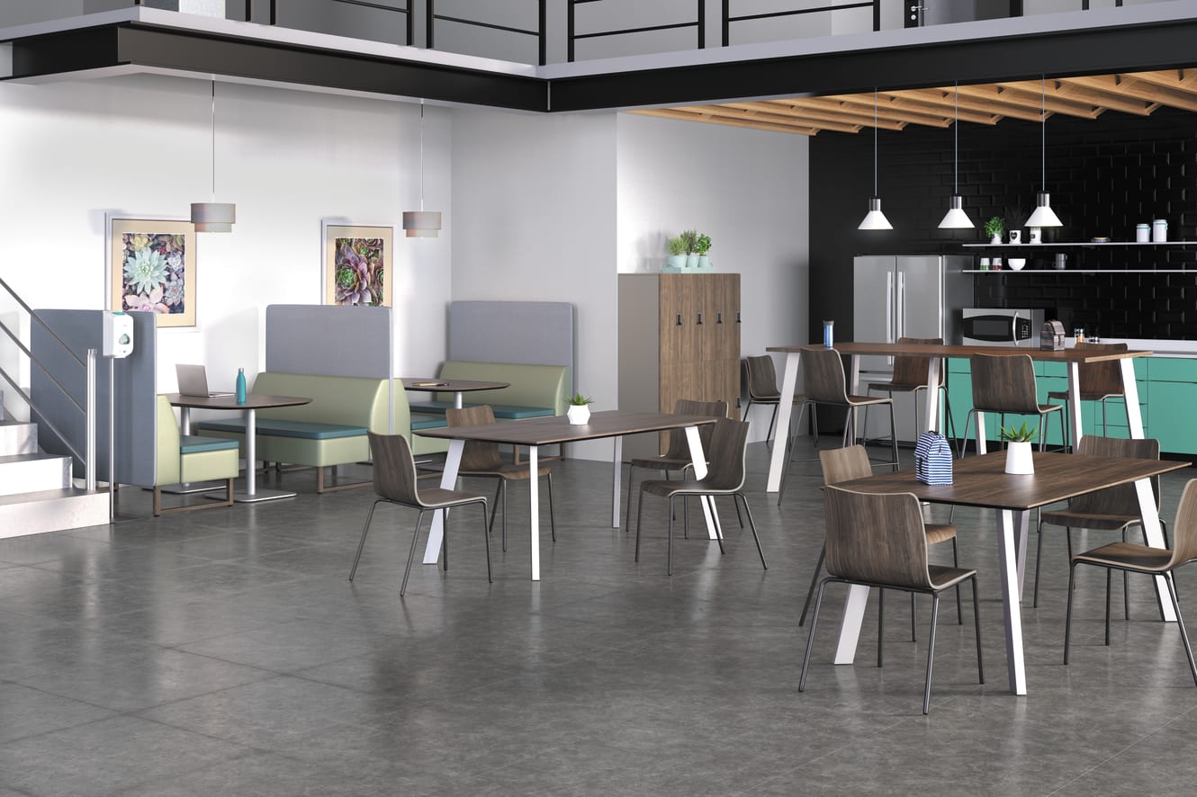 A modern and minimalist dining area with a mix of wooden and metal furniture, including a long table, chairs, and a kitchen area with shelves and appliances in the background.