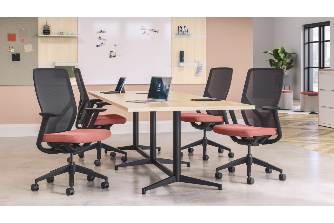 Preside conference table with Flexion task chairs and Workwall markerboard tile, fabric tile and laminate tiles.