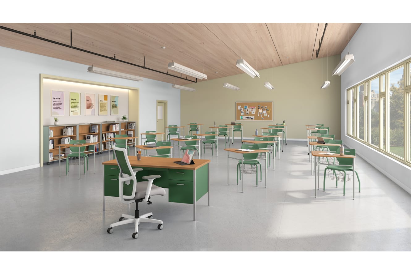Classroom with triangle SmartLink desks and green student chairs.