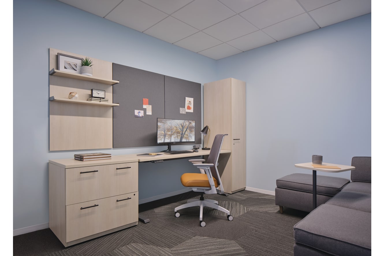 Concinnity desk with Cipher task chair, Workwall laminate and fabrics tiles, West Hill lounge seating, and Birk personal table.