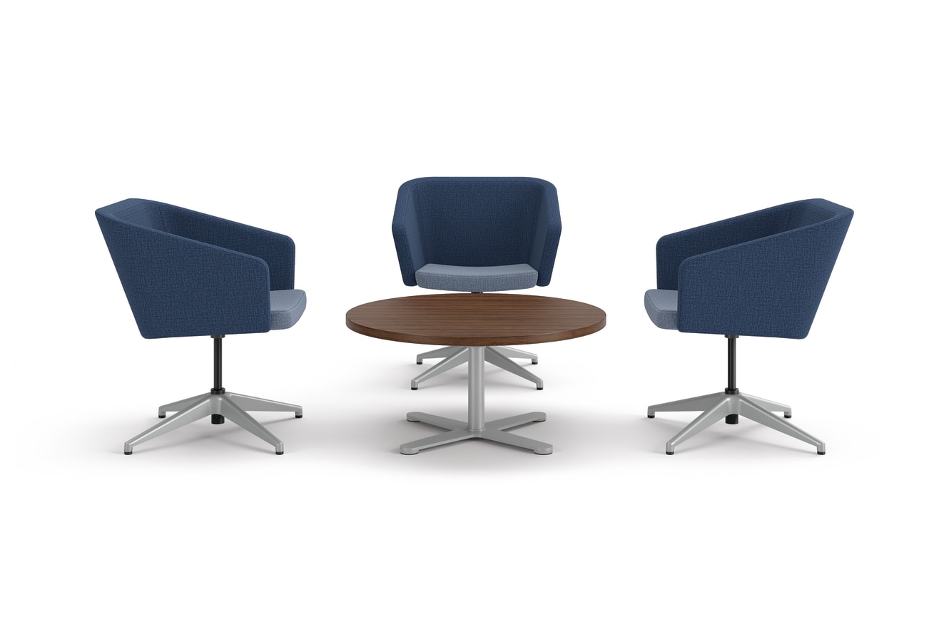Flock dual fabric square chairs around a round occasional table.