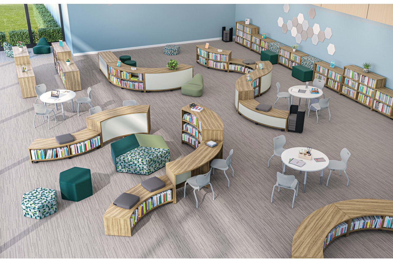 Top-down view of Storyline bookcases and bistro tables in unique configurations throughout a  library.