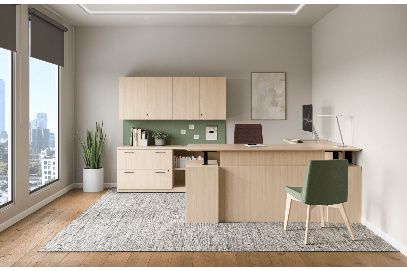 Concinnity Height-Adjustable Single Desk in light laminate with Flock and Cofi chairs in front of laminate storage in a private office.