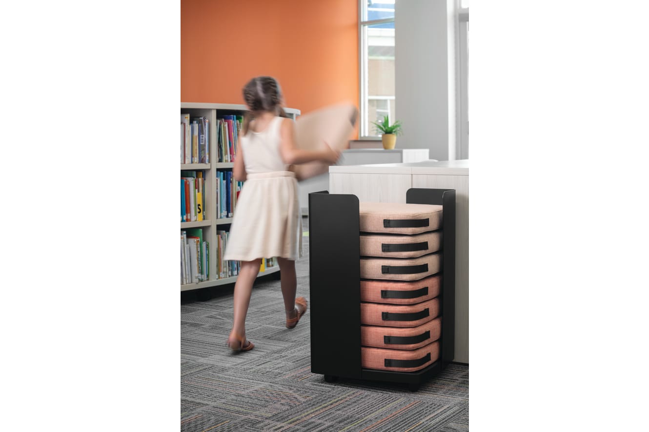 Storyline Bookcases with Confetti Floor Cushions.
