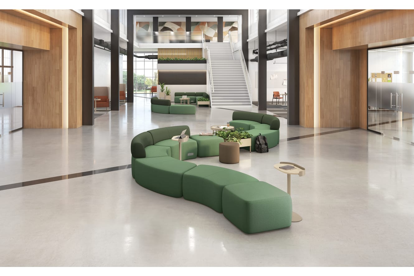 An education administrative setting featuring SoCo lounge seating and Sculpt tables.