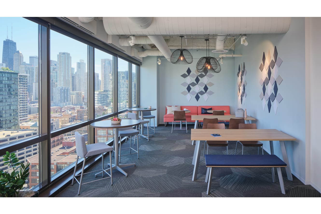 Preside café tables, Ruck Shell Chairs, Astir Two Seat Low Back, and Unika Vaev Solid Color Wall Tiles. 
