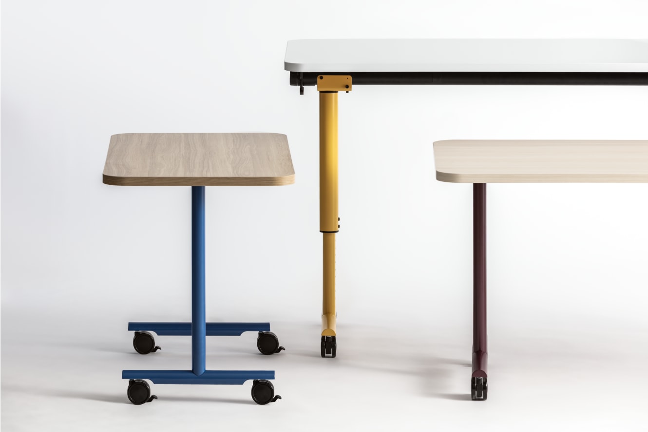 Assorted Field Trip Tables with painted legs.