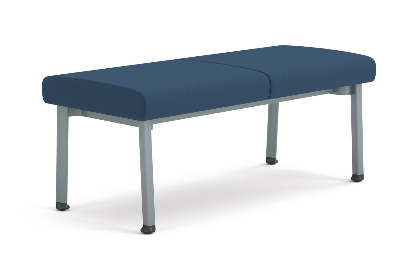 Modern two-seat bench with blue upholstered cushions and metal legs, designed for waiting areas or collaborative spaces