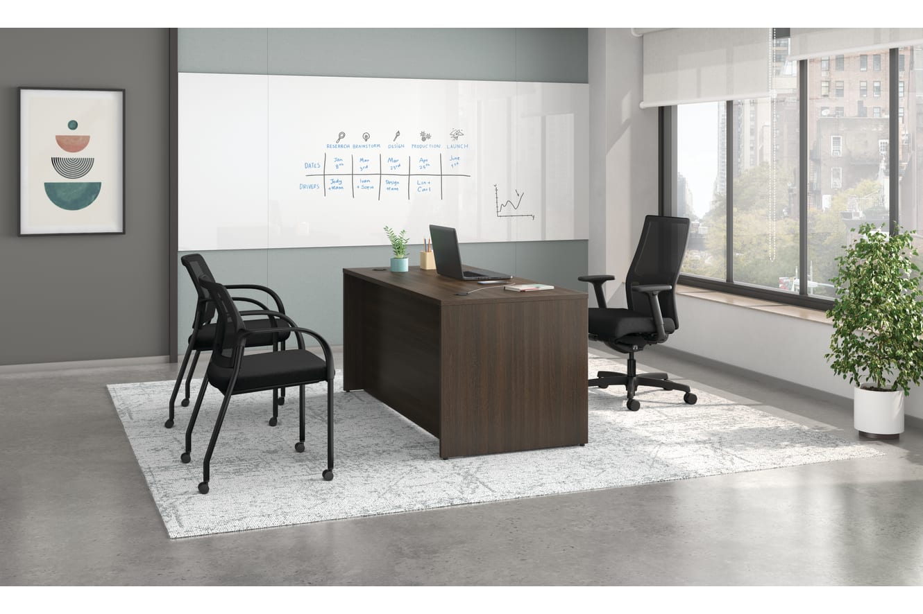 Mod desk with Ignition task and guest seating.