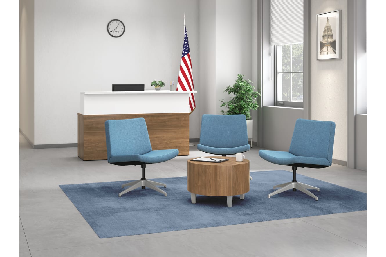 A welcome area setting featuring a Concinnity reception station and Flock lounge seating.