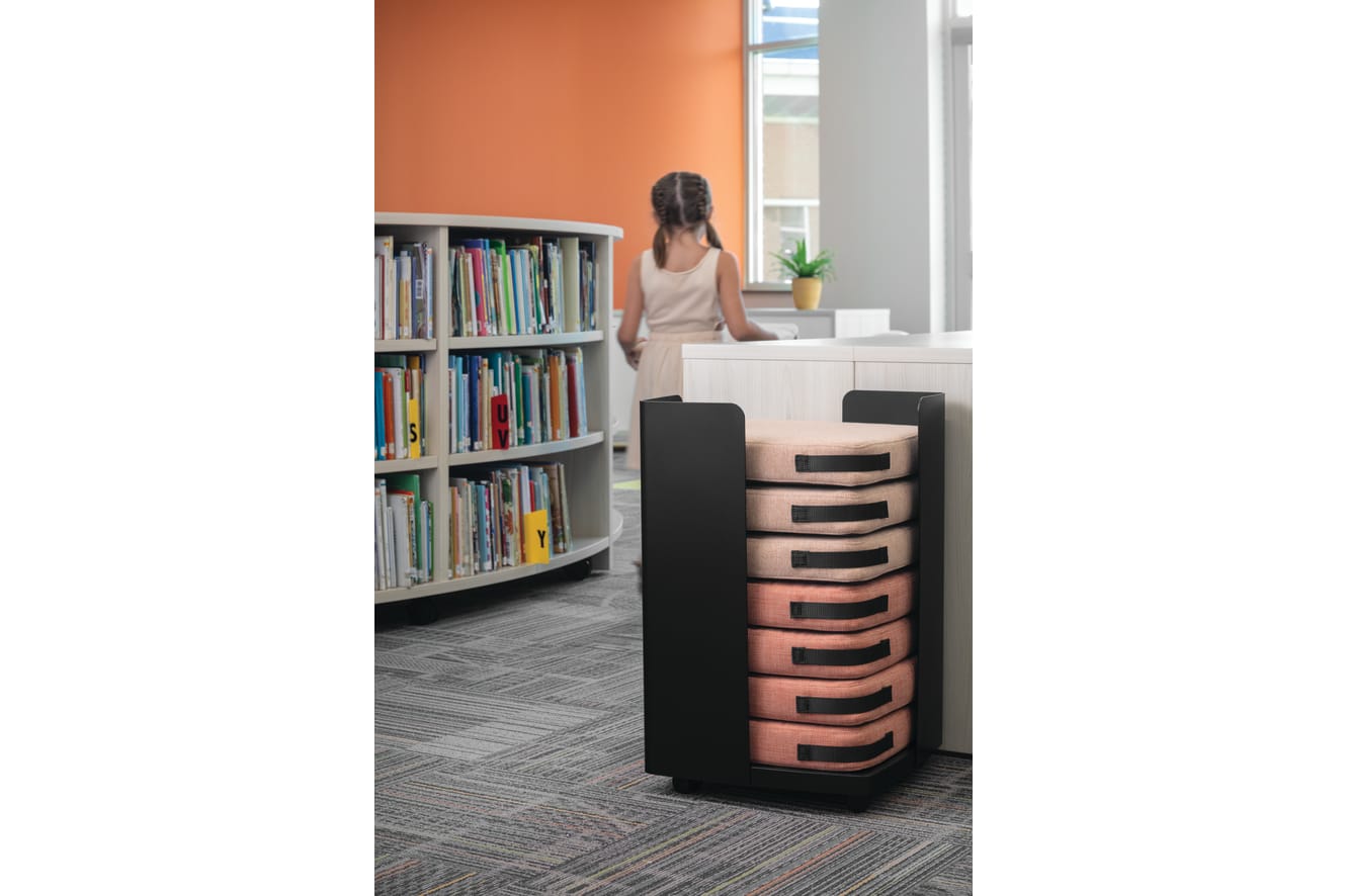 Storyline Bookcases with Confetti Floor Cushions.