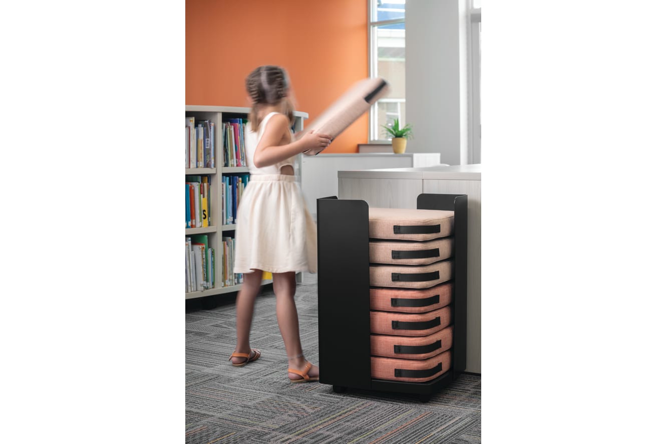 Storyline Bookcases with Confetti Floor Cushions.