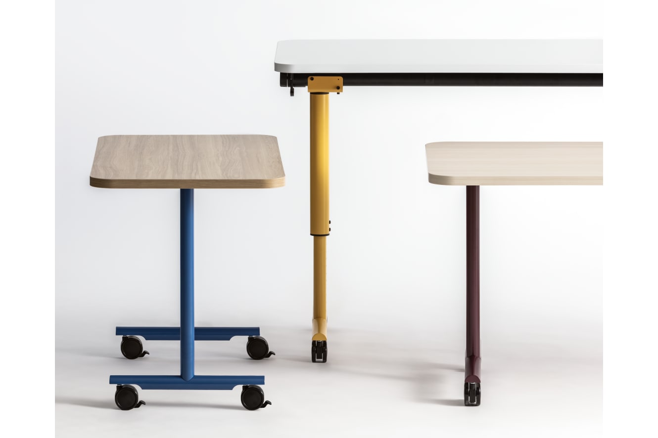 Assorted Field Trip Tables with painted legs.