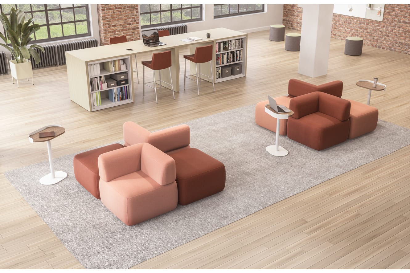 SoCo modular lounge in collaborative area with Sculpt personal tables & planter near Storage Island.