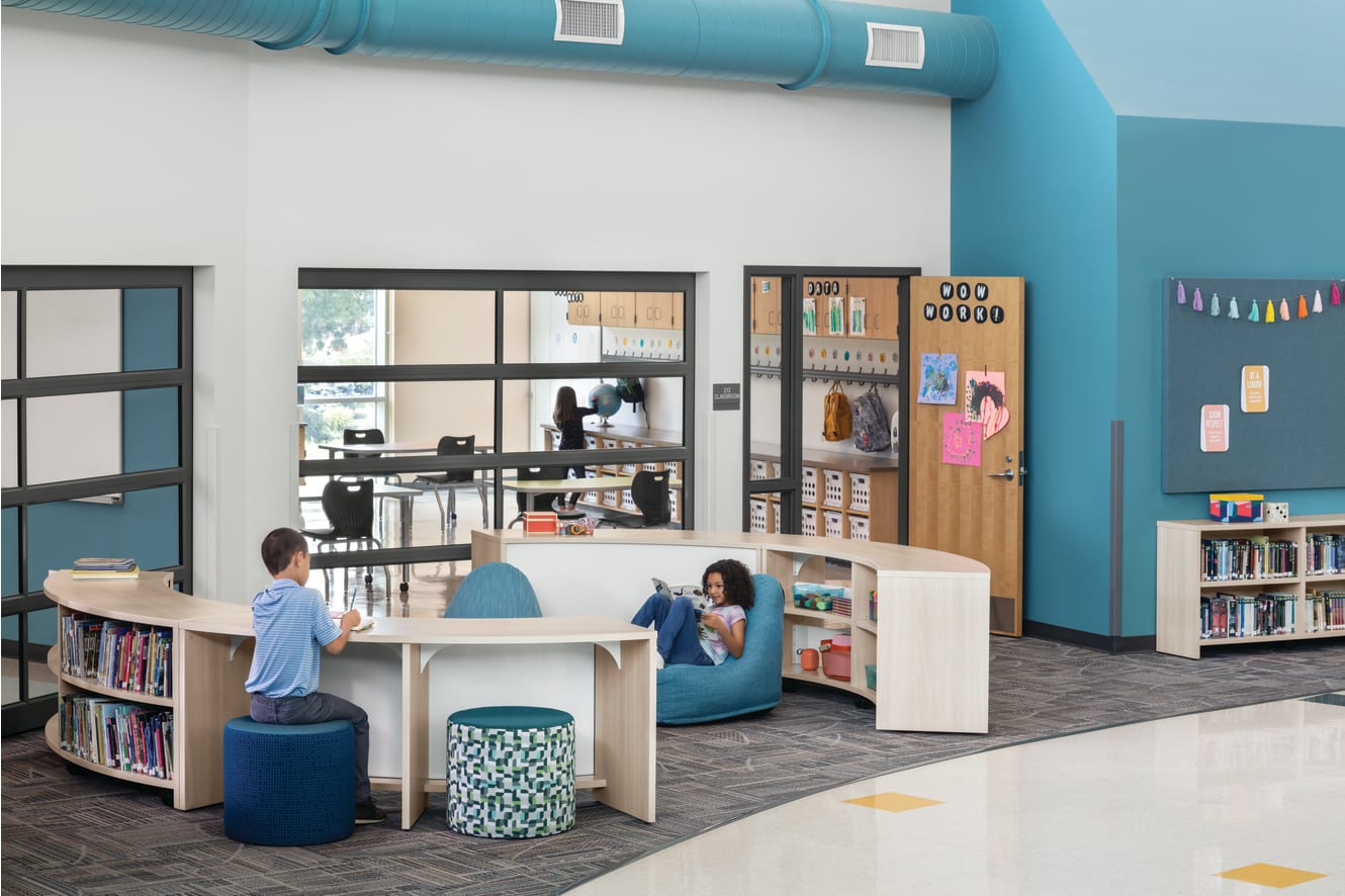 Storyline Bookcases and Bistro Tables with Confetti Floor Lounge and Flock Minis.