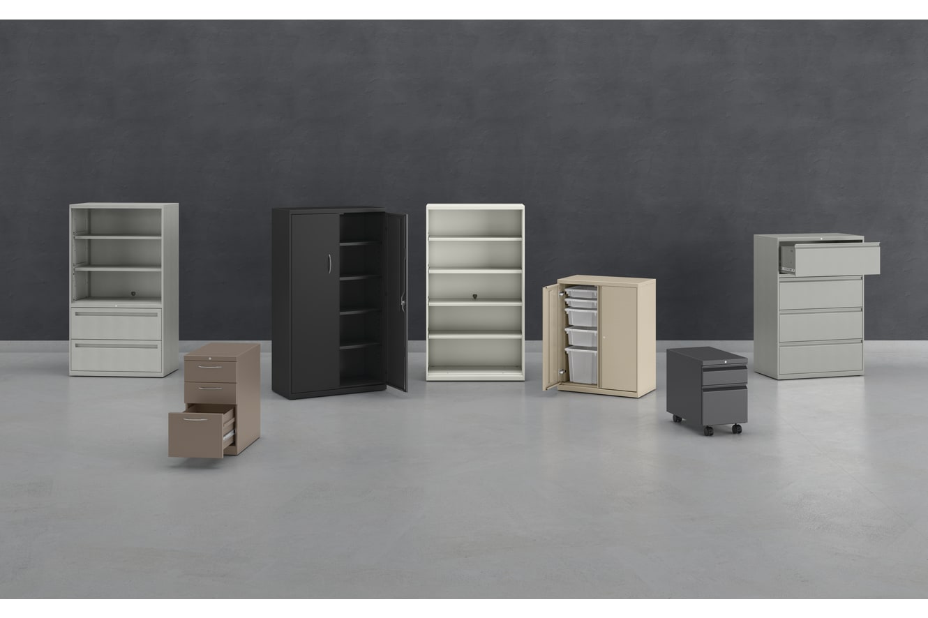 Various office furniture pieces, including shelves, cabinets, and drawers, are arranged on a plain gray background.