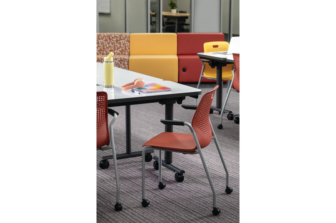 Orange Etch chair at a Field Trip table.