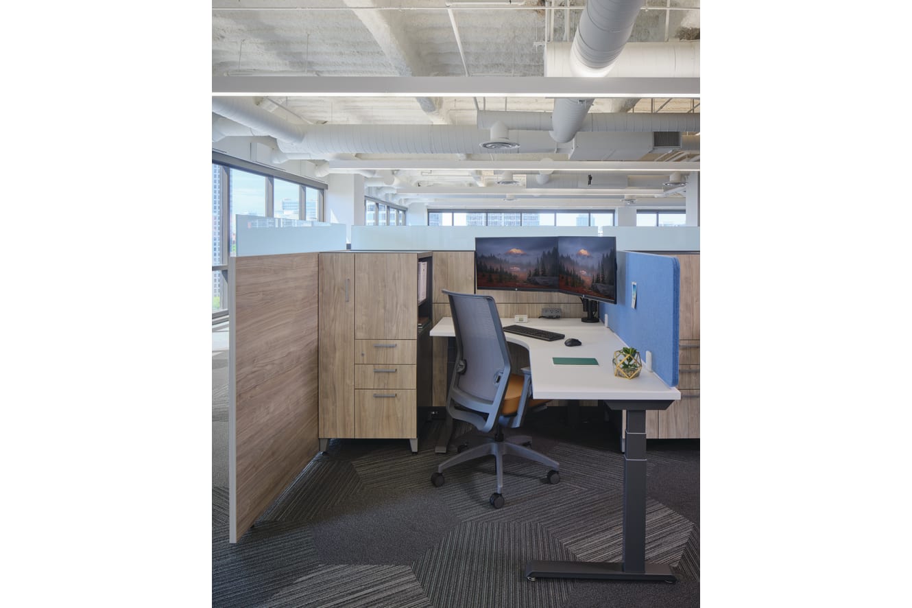 Abound workstations with Contain storage, Coordinate HAT desks, and Universal Screens shown with Cipher task seating
