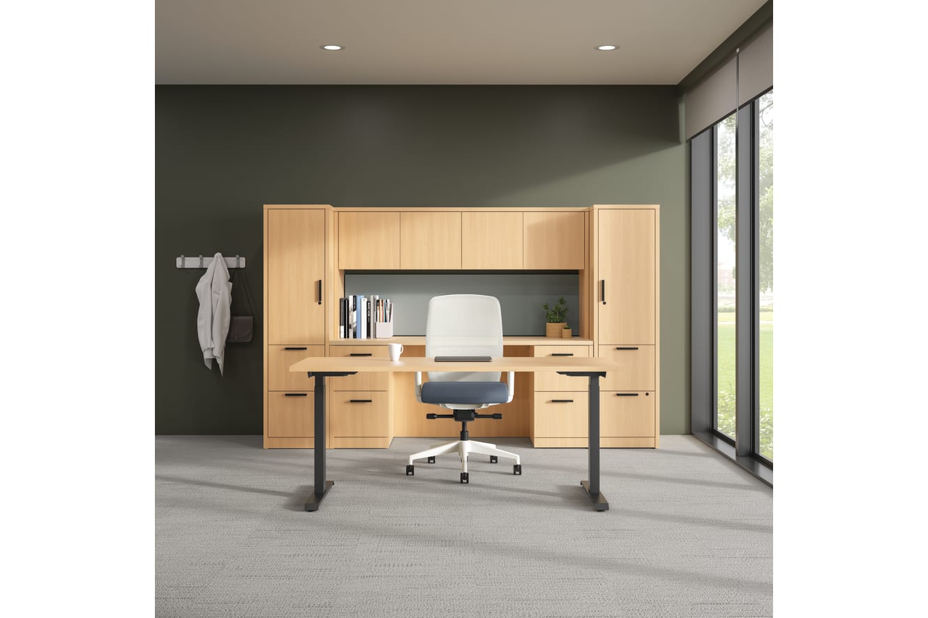 10500 Series executive office shown with a height-adjustable workstation and Nucleus task chair