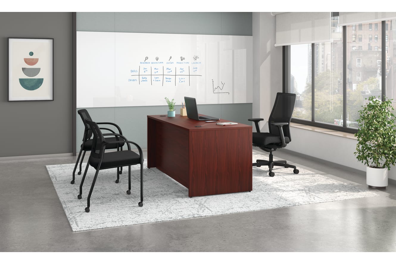 Mod desk with Ignition task and guest seating.