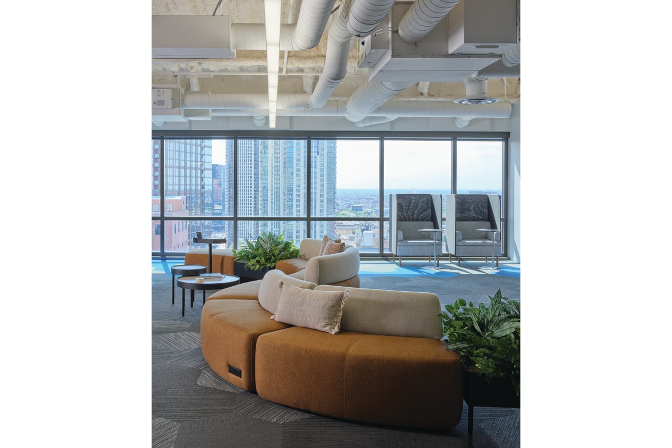 SoCo shown with Sculpt personal tables and Sculpt planters. 