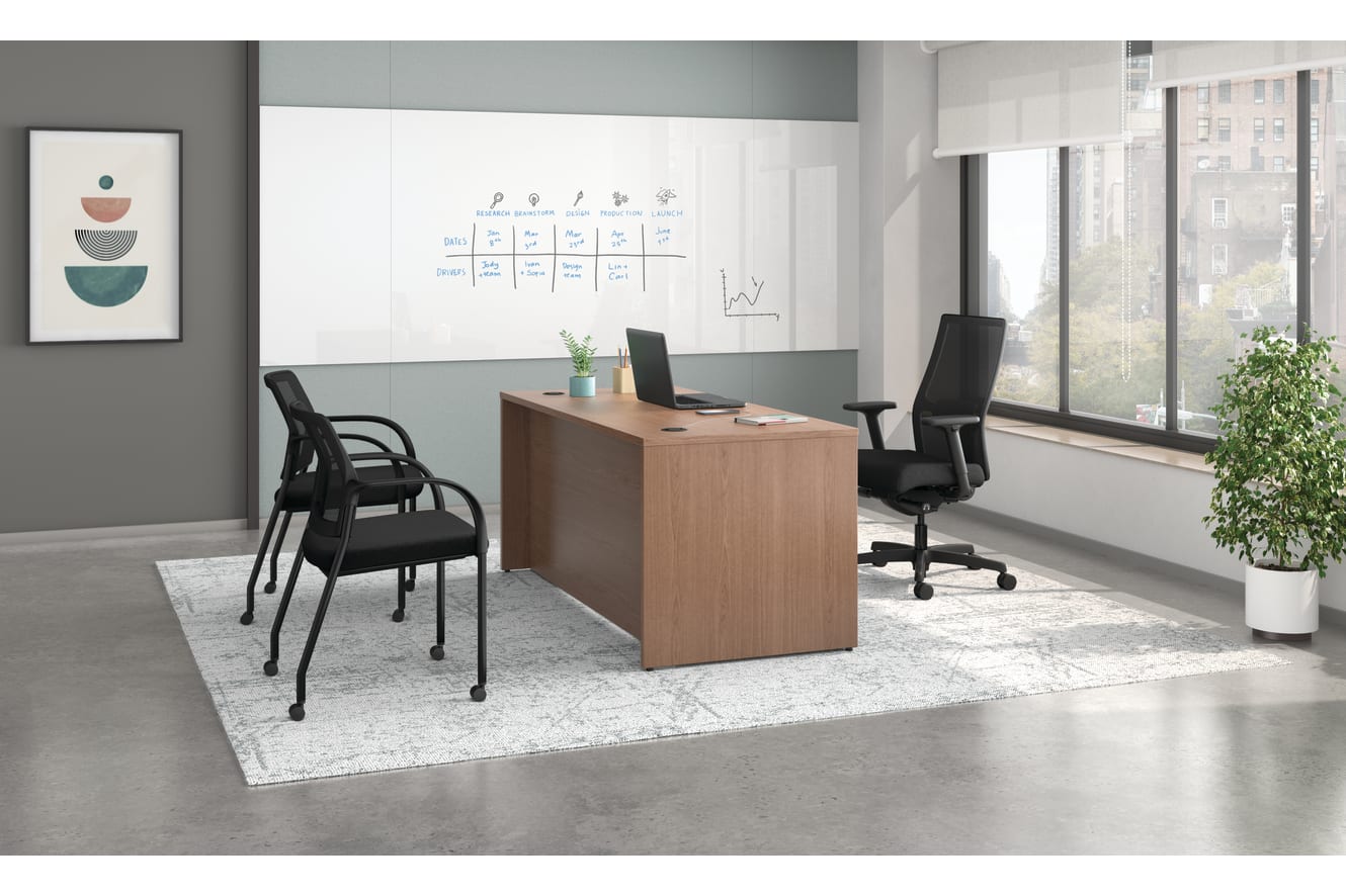 Mod desk with Ignition task and guest seating.