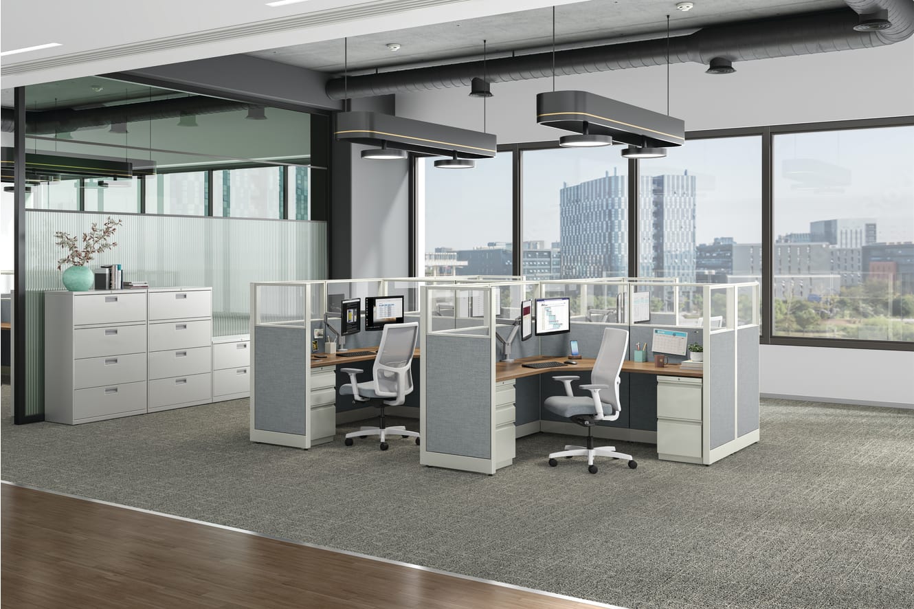 Accelerate workstations shown with Ignition task chairs and Brigade storage.