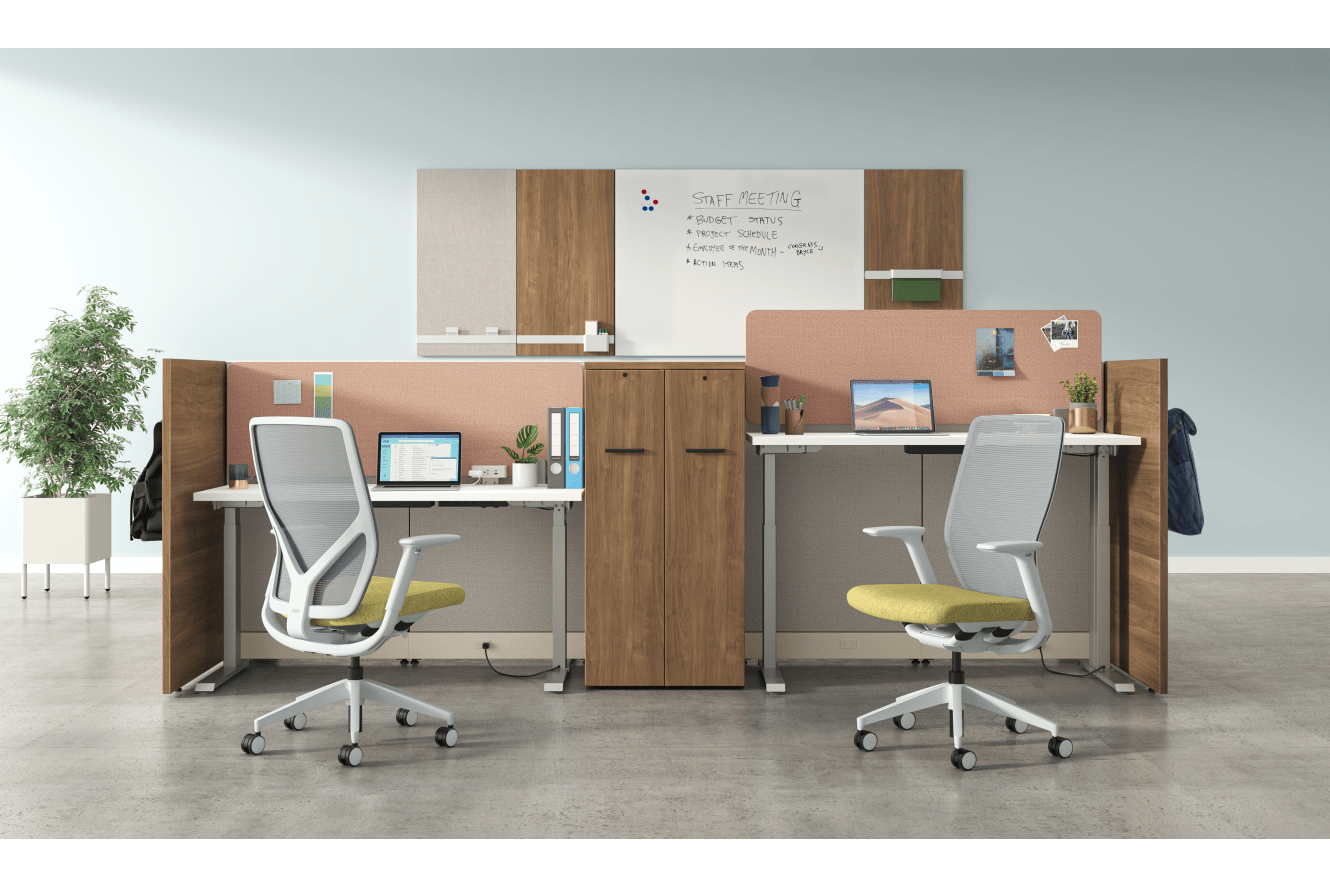 A modern and minimalist office space with desks, chairs, and various office supplies and decor elements.