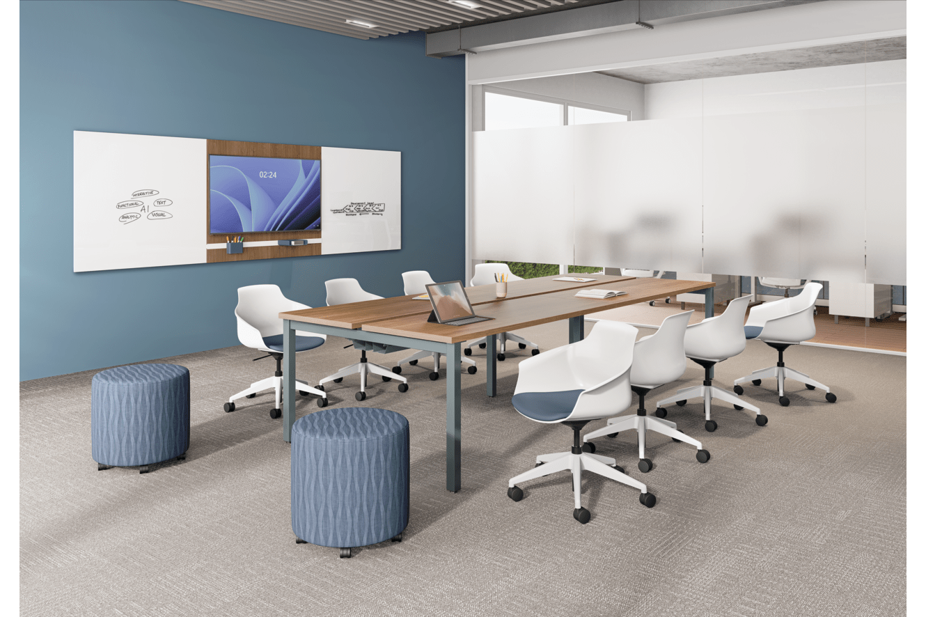 Modern conference room with long meeting table, white task chairs, wall-mounted presentation screen, blue accent wall, and glass partition.