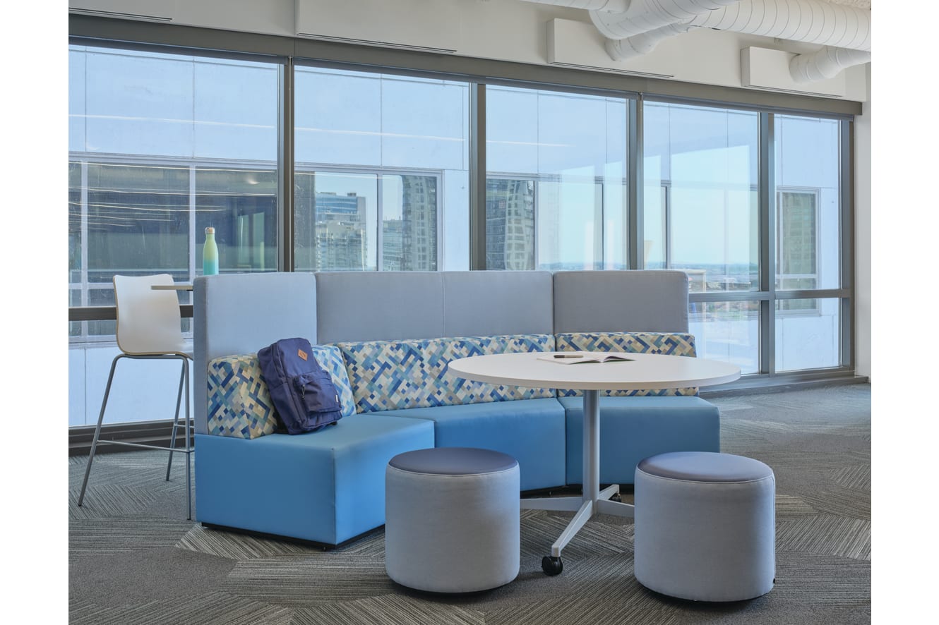 Tangram soft seating with Preside table and Flock round minis and Ruck stools.