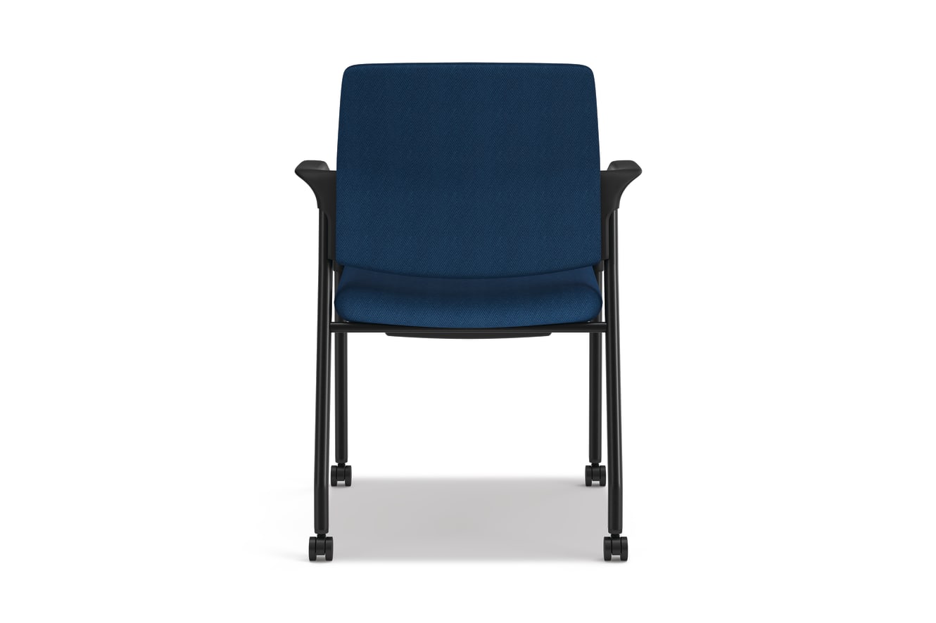 A back view of an Ignition HIGS6 multi-purpose chair with blue fabric and black frame.