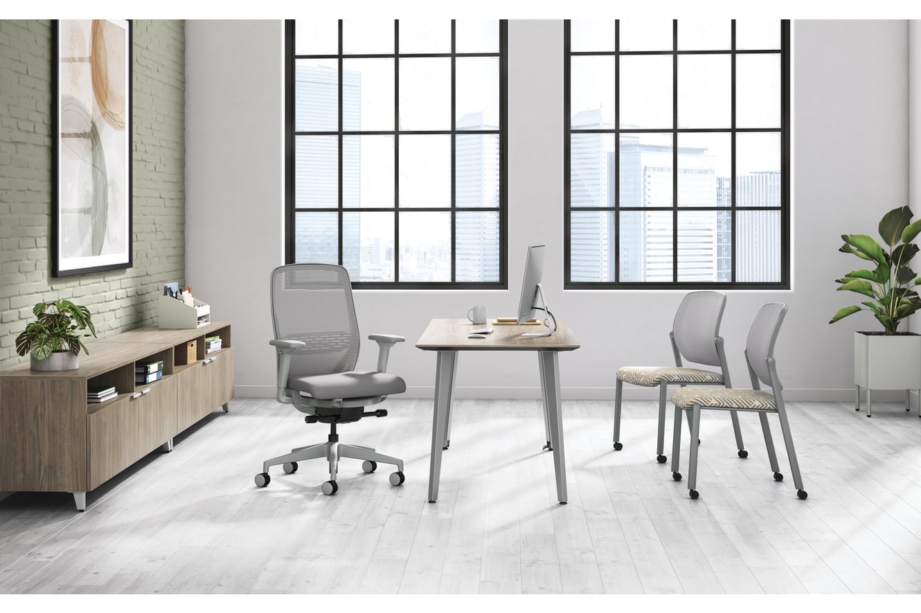 A private office setting featuring Nucleus task and guest seating with Voi desk and storage.