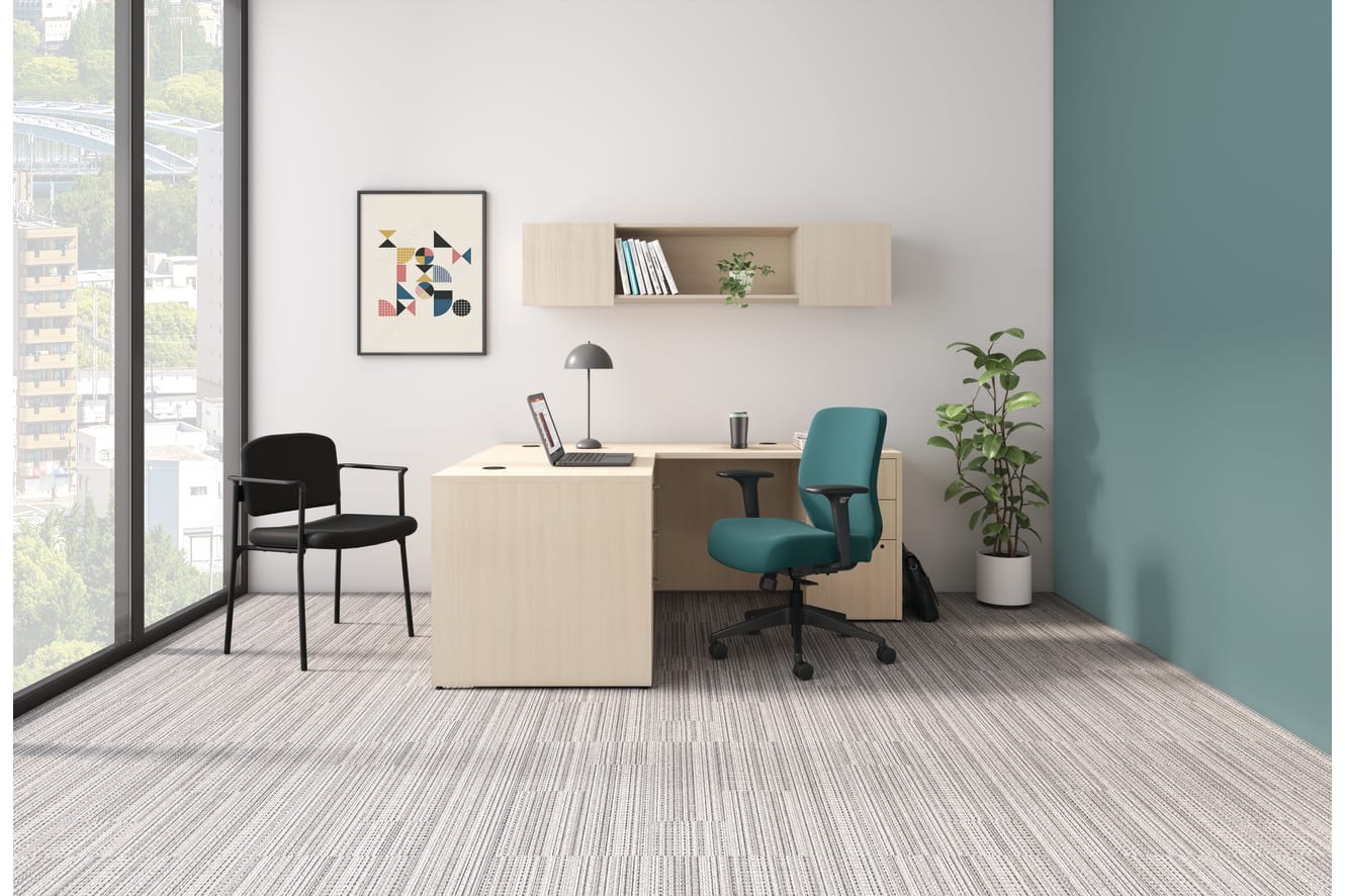 Private office shown with a light laminate desk and a teal Altern task chair 