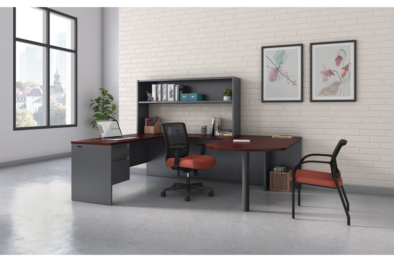 A modern and minimalist home office setup with a desk, chair, shelving unit, and decorative wall art in a bright, airy room with a large window.