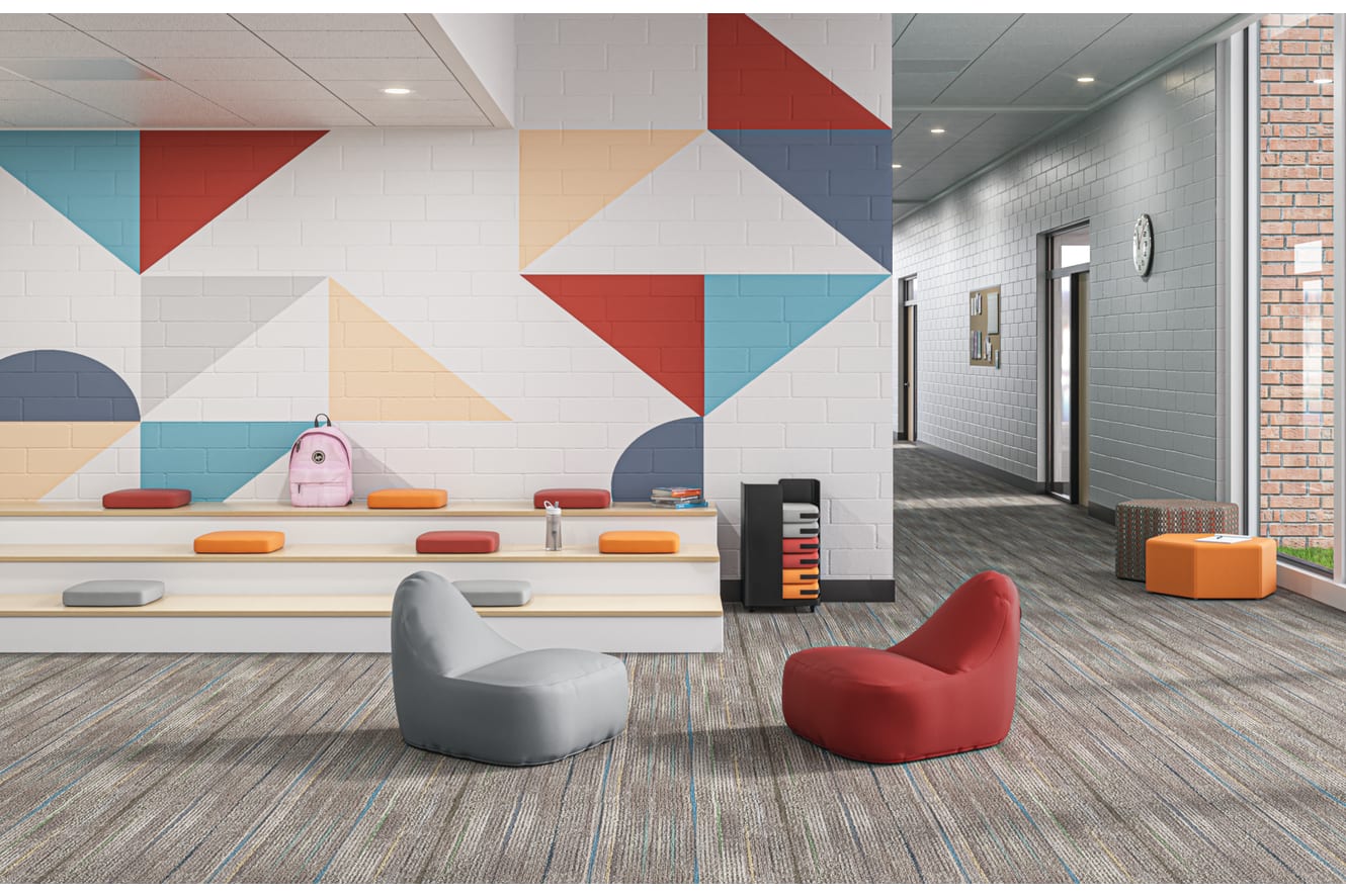 Confetti Floor Lounge and Floor Cushions with Confetti Storage Cart and Tangram Poufs.