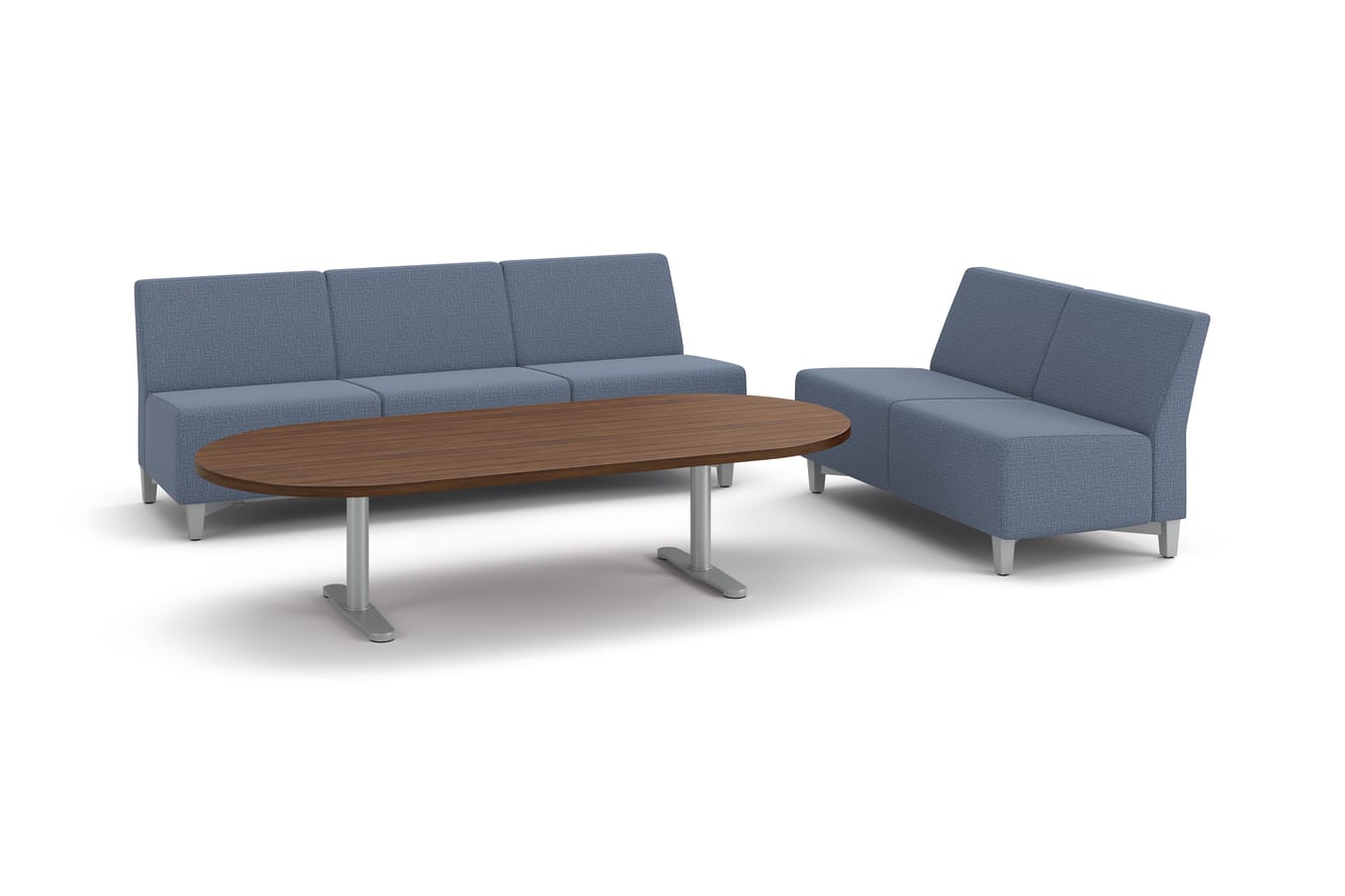 Flock 3-seat and 2-seat sofas with racetrack occasional table.