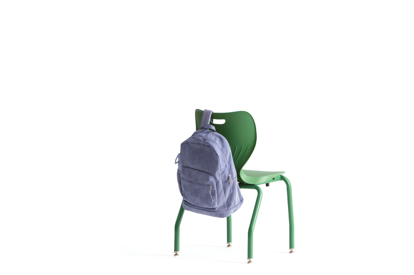 One green Smartlink chair with a backpack.