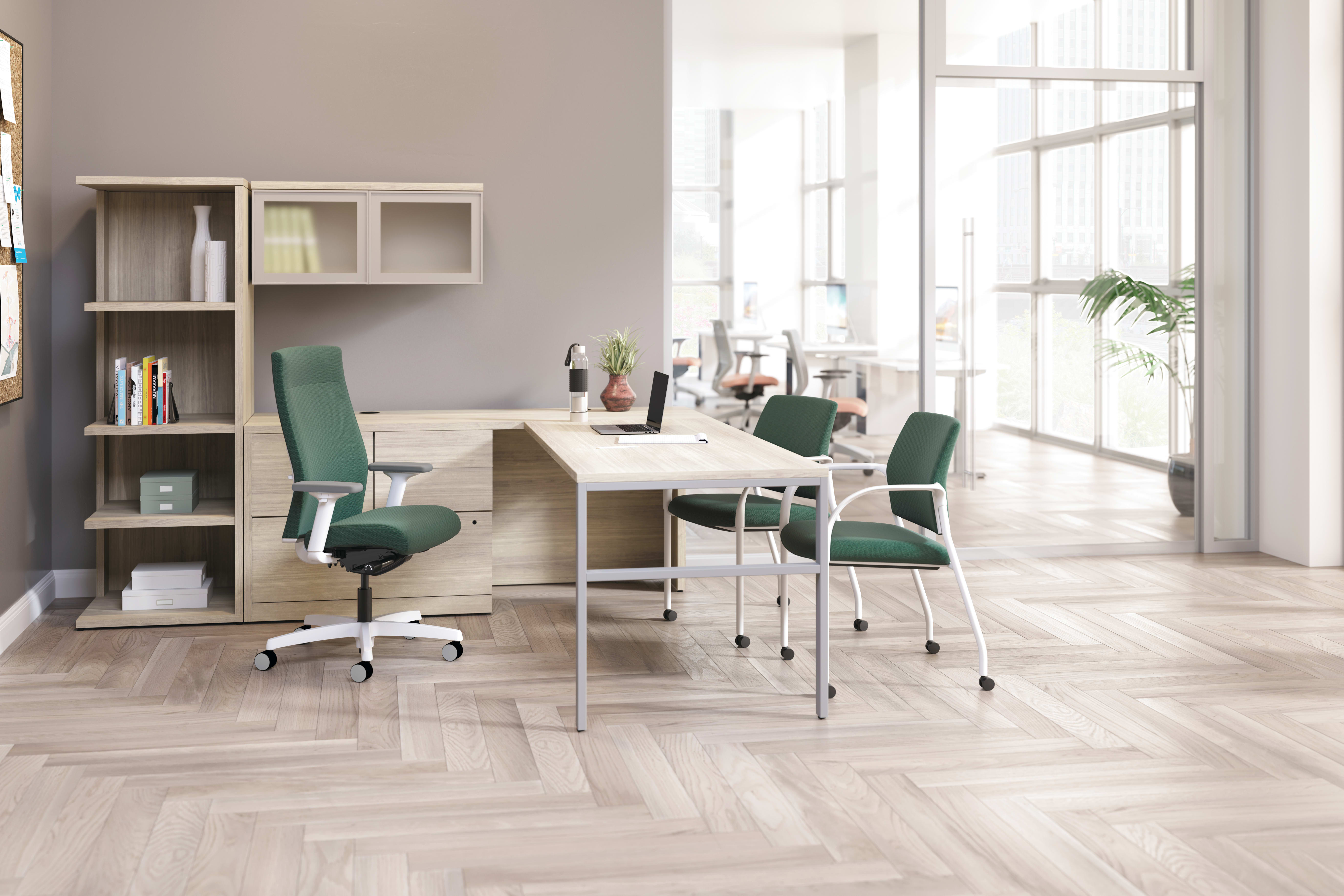 Ignition upholstered chair at 10500 Series L-shaped desk with 2 guest chairs.