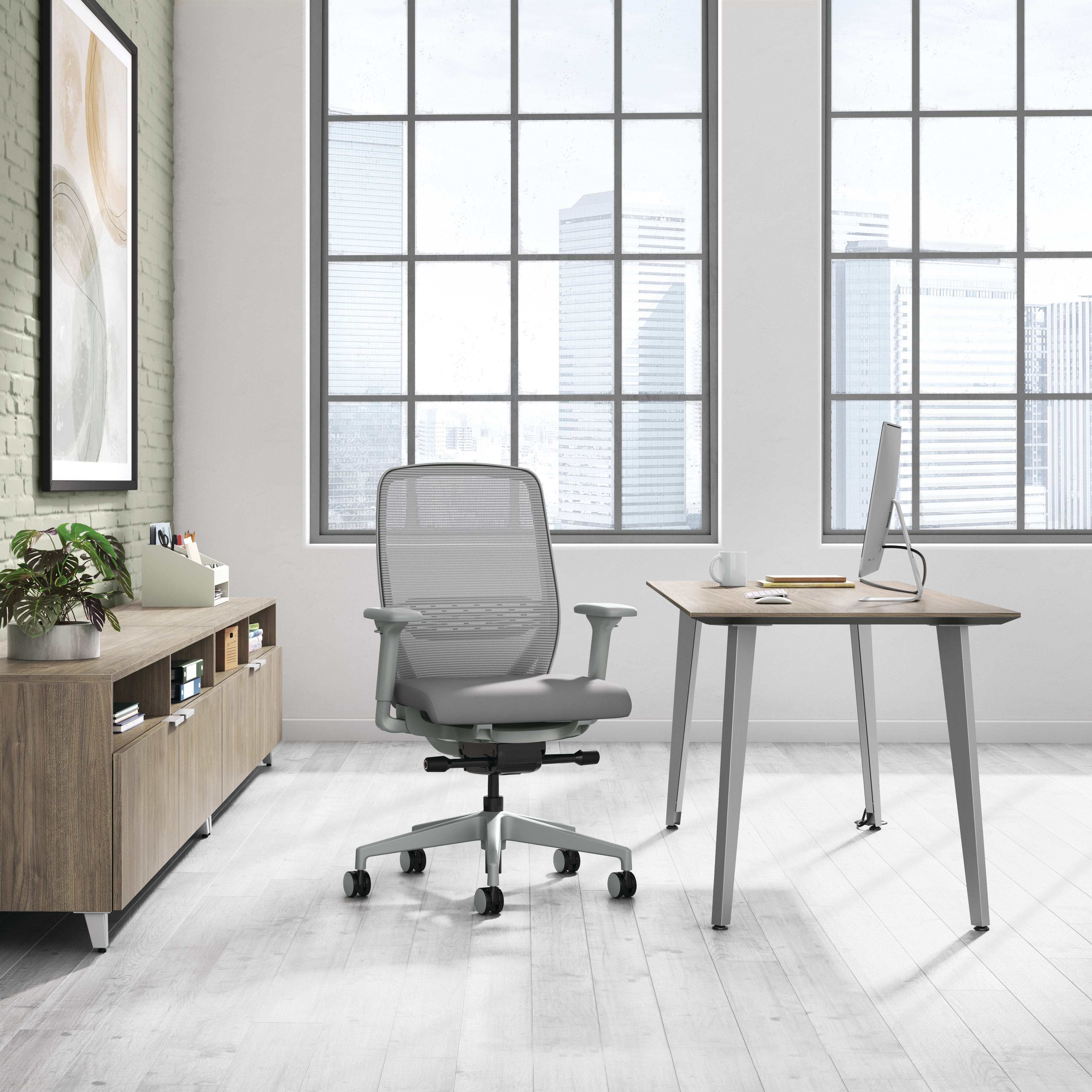 A private office setting featuring Nucleus task seating with Voi desk and storage.