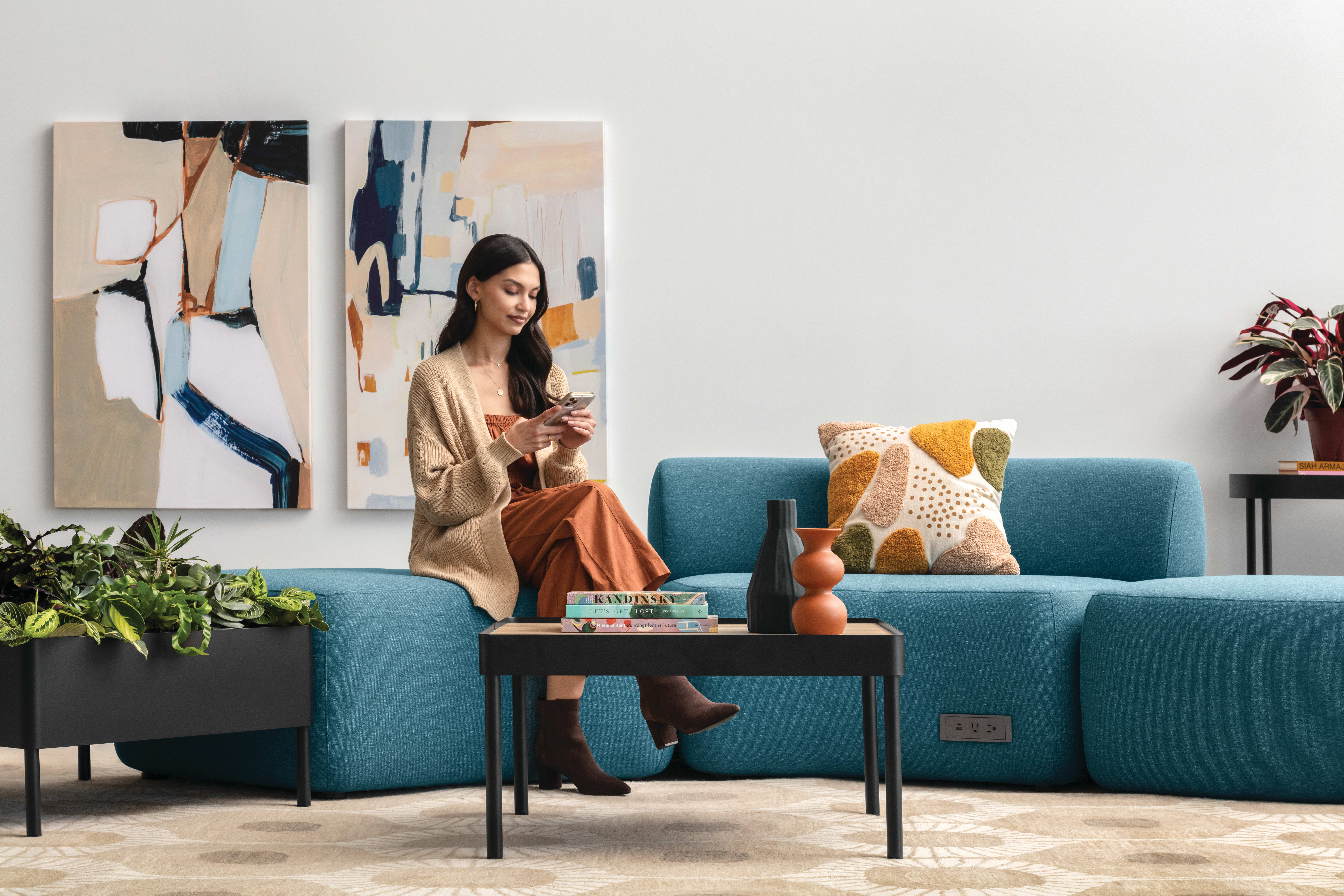 SoCo with Sculpt tables and planter and Flock seating