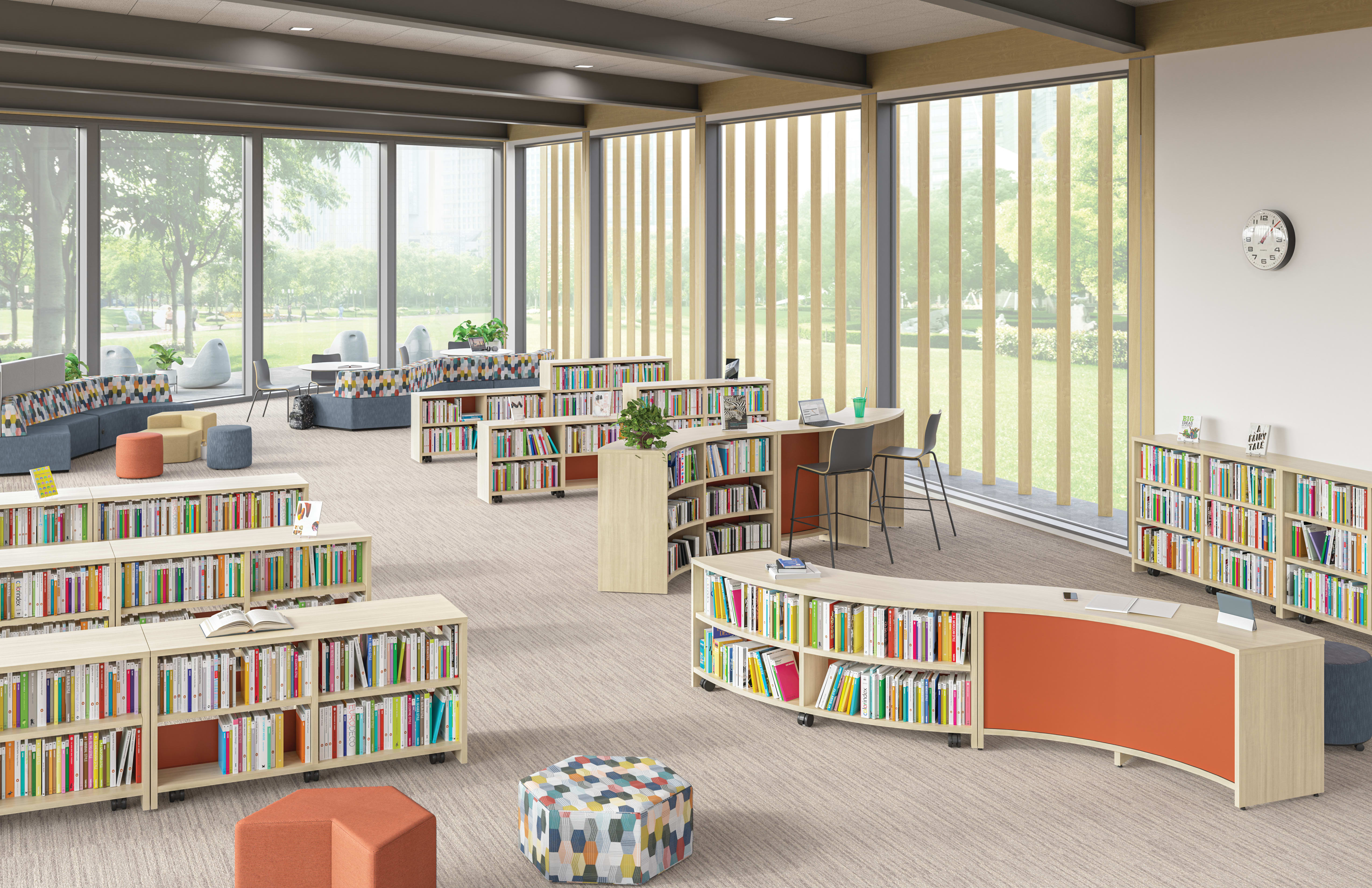 School media center featuring rows of Storyline bookcases and bistro tables to create spaces for reading or studying.