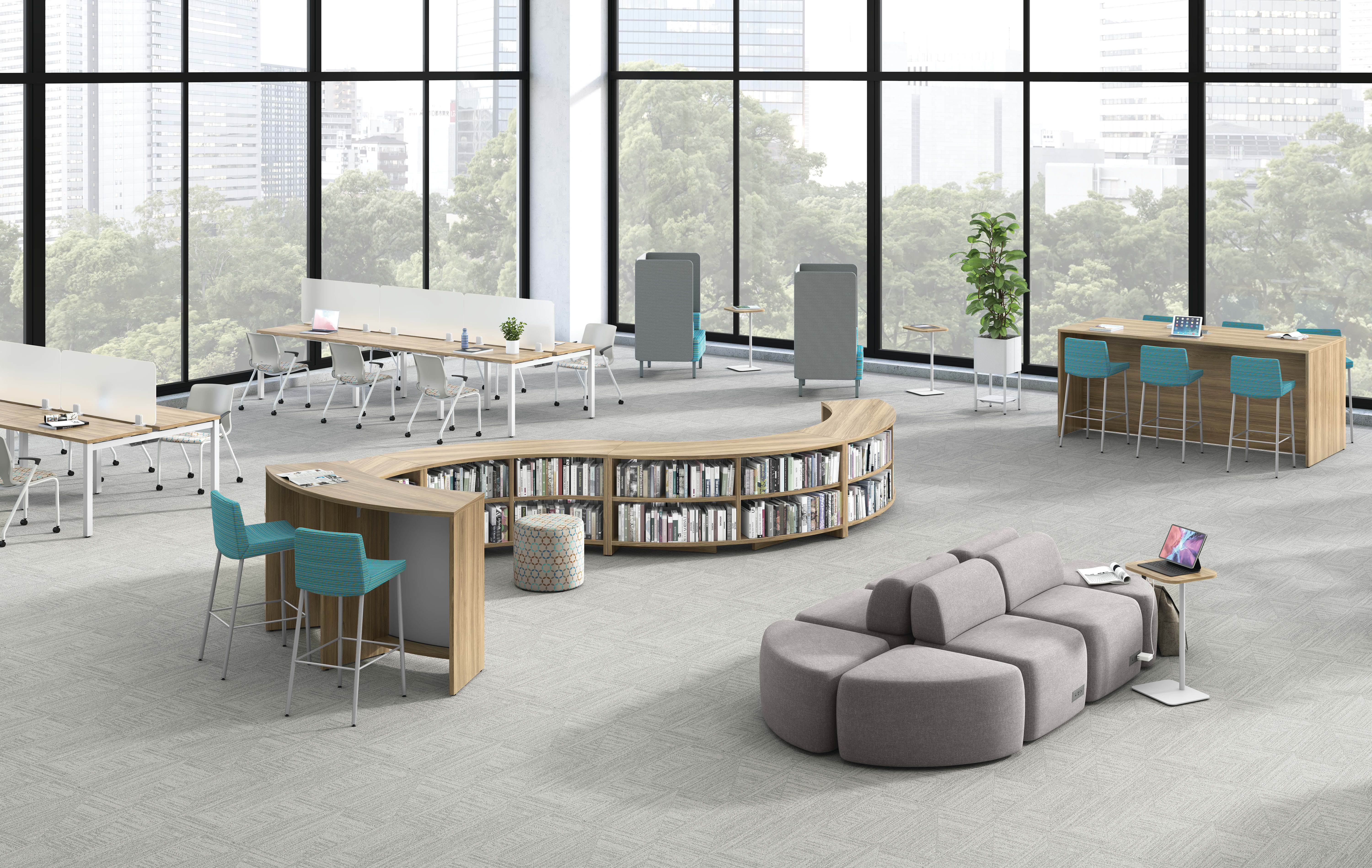 A multi-media center setting featuring Storyline bookcases, SoCo seating, and Empower benching.