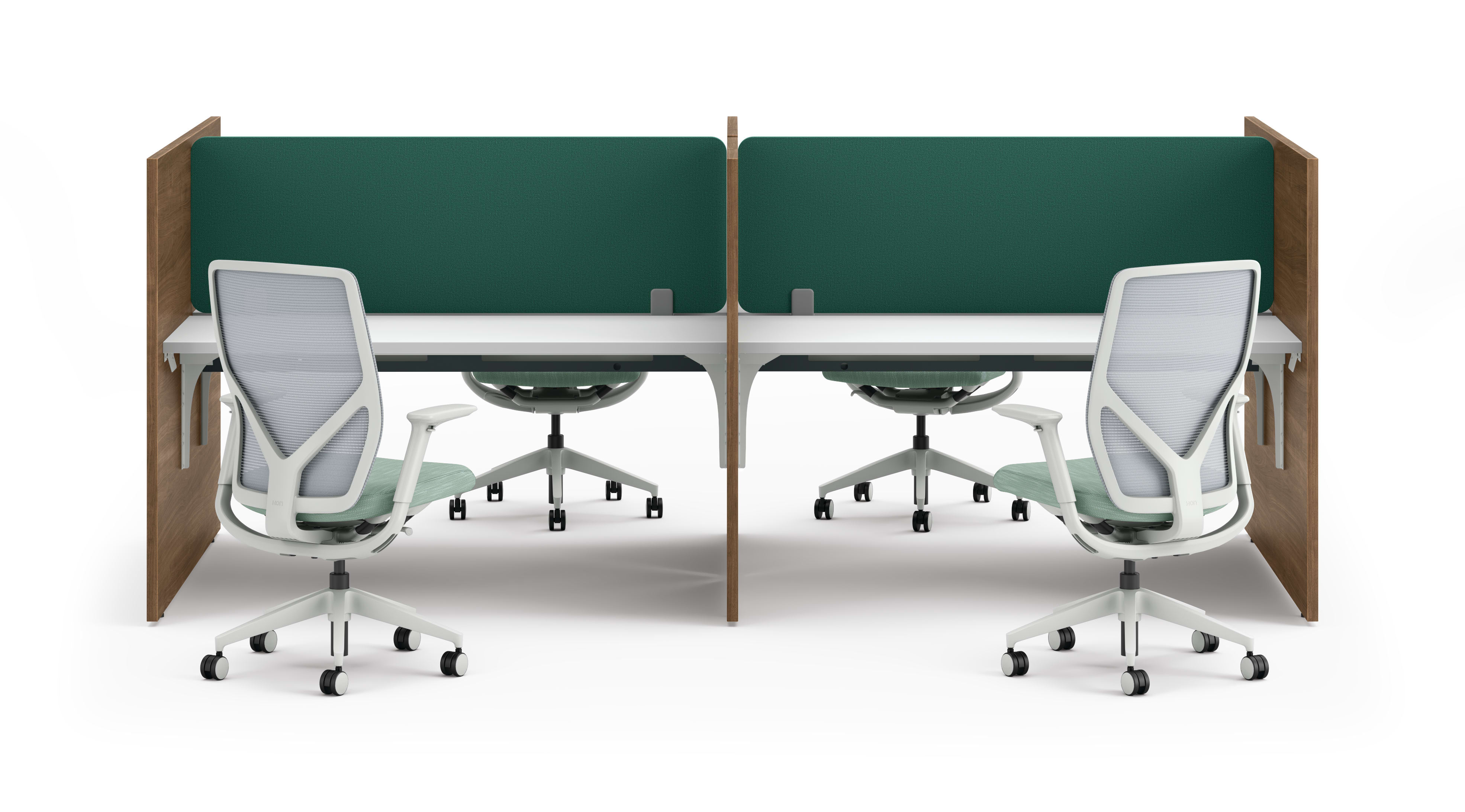 Two workstations with green fabric privacy panels, white desks, and ergonomic office chairs framed by wooden side panels.