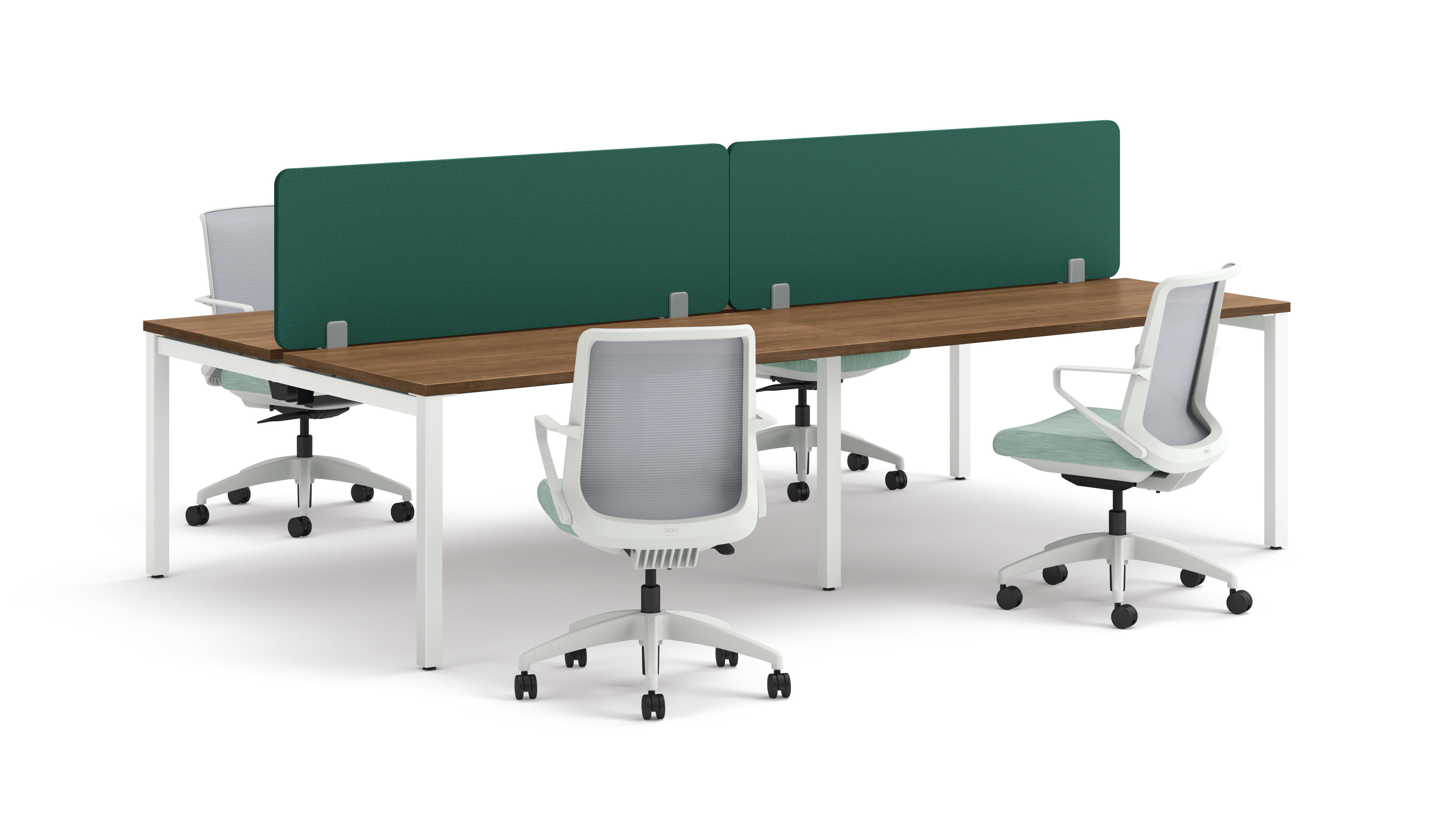 Four ergonomic office chairs positioned around two connected desks with wooden tops, white legs, and green fabric privacy panels.