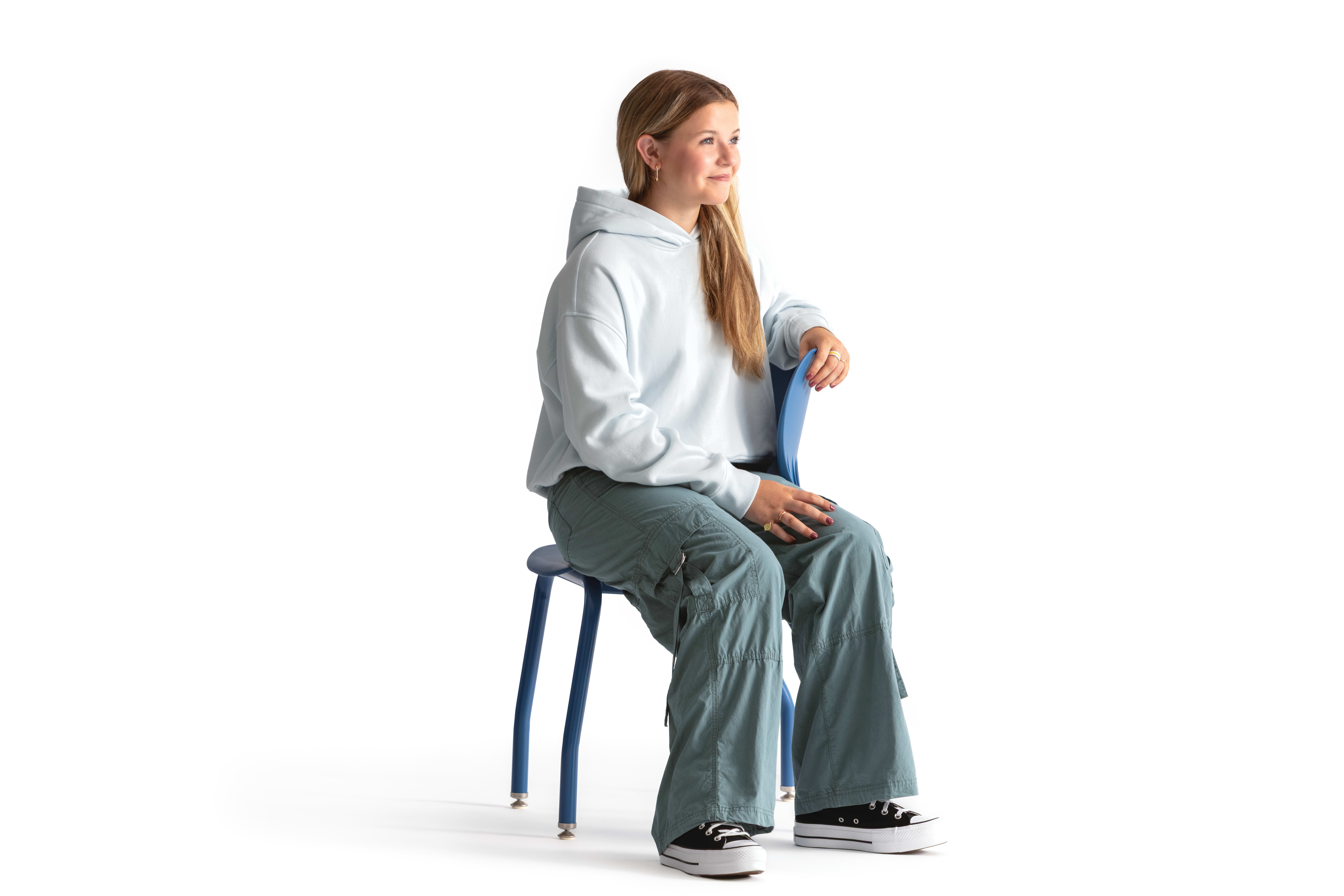 One seated student on a blue monotone Smartlink chair. One seated student on a blue monotone Smartlink chair. One seated student on a blue monotone Smartlink chair. One seated student on a blue monotone Smartlink chair. One seated student on a blue monoto