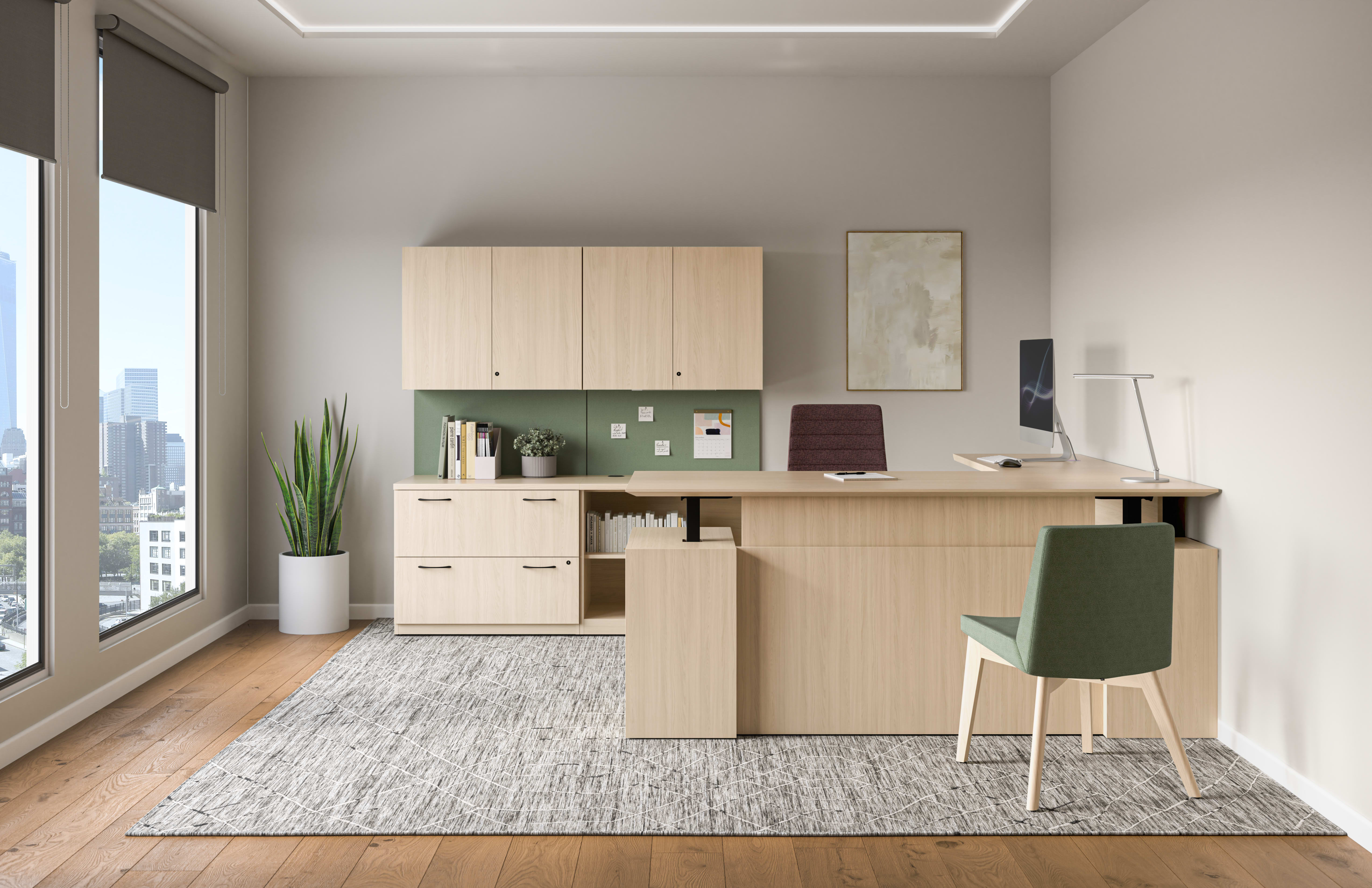 Concinnity Height-Adjustable Single Desk in light laminate with Flock and Cofi chairs in front of laminate storage in a private office.