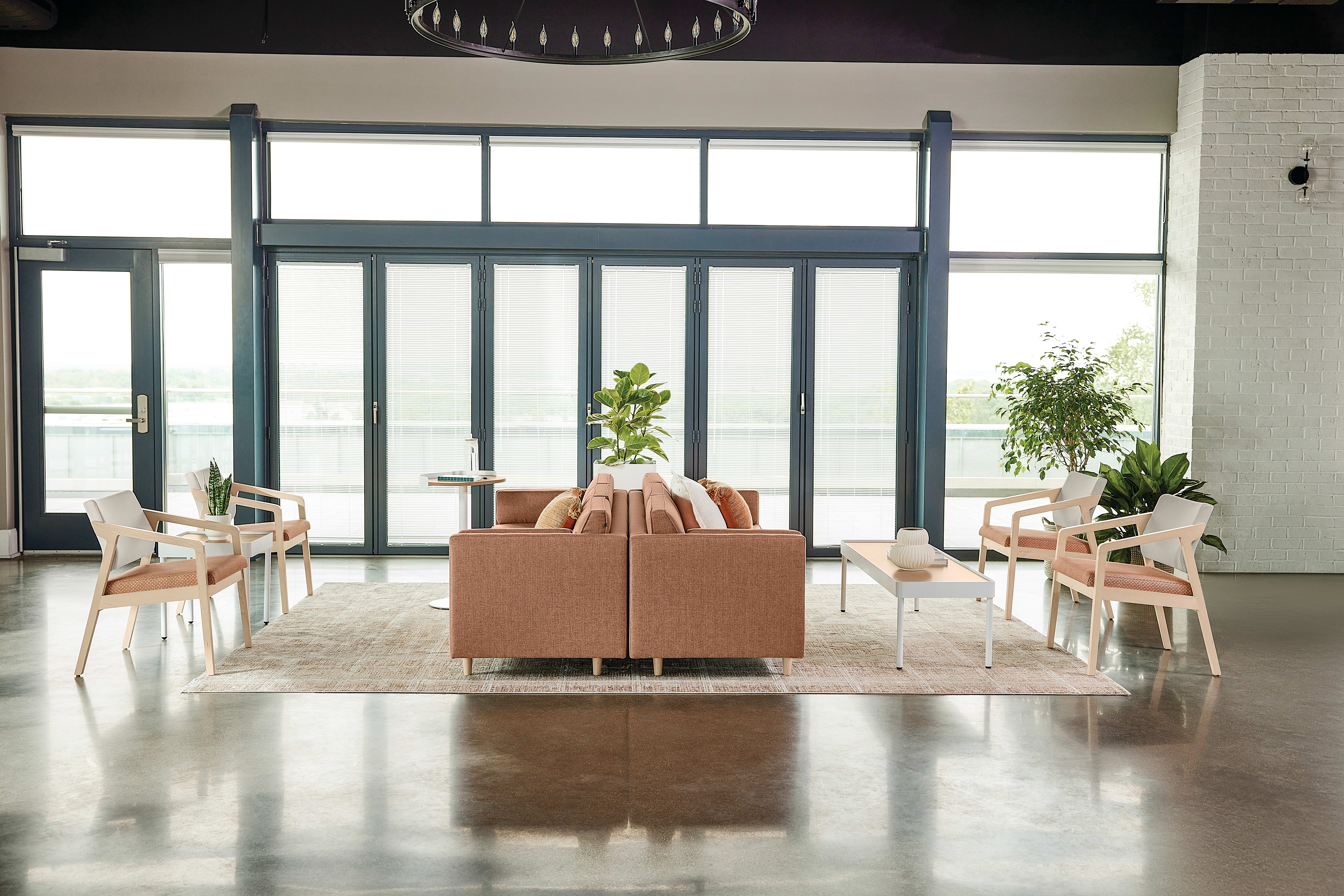 Confer chair with West Hill sofa and Sculpt tables 