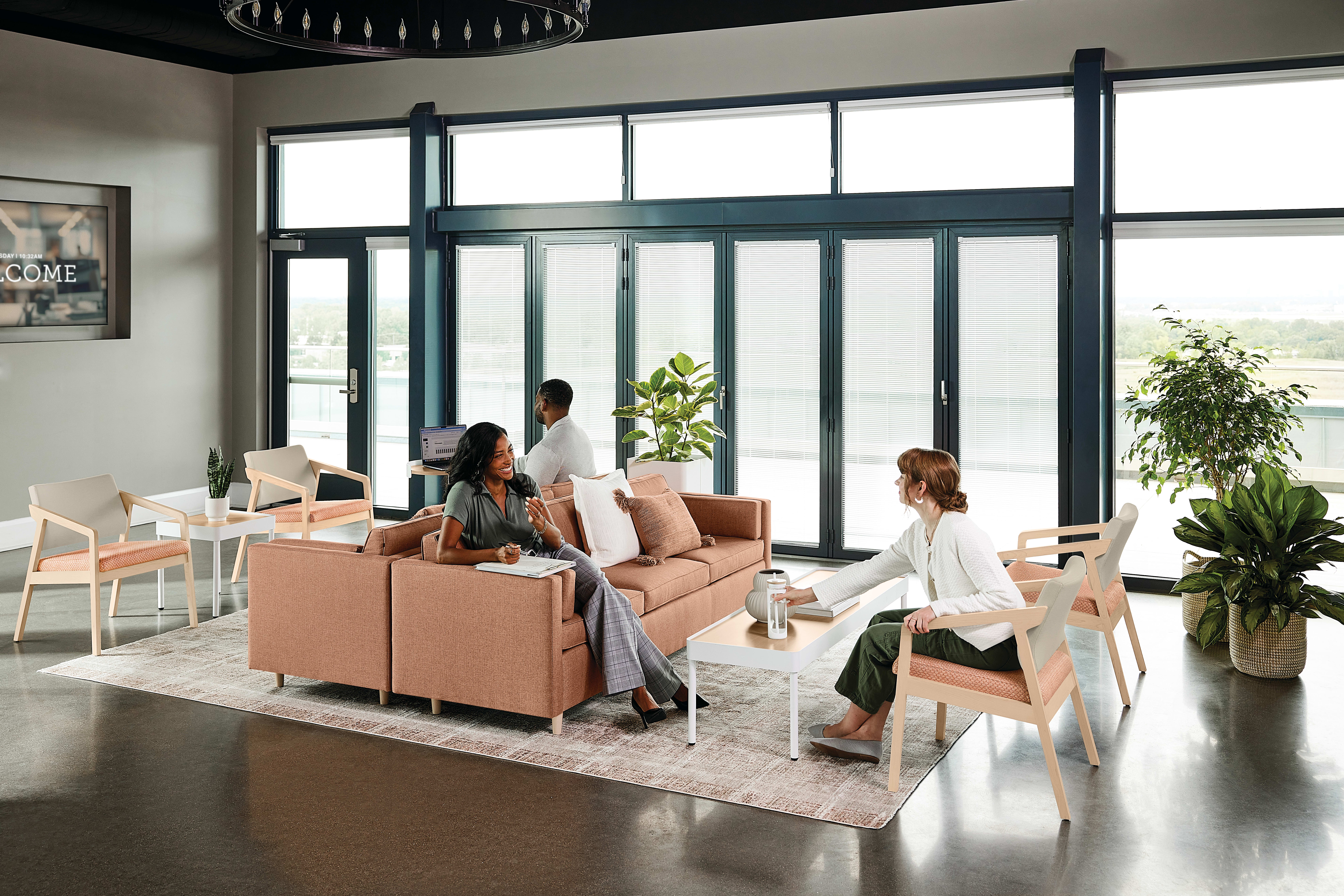 Confer chair with West Hill sofas and Sculpt tables